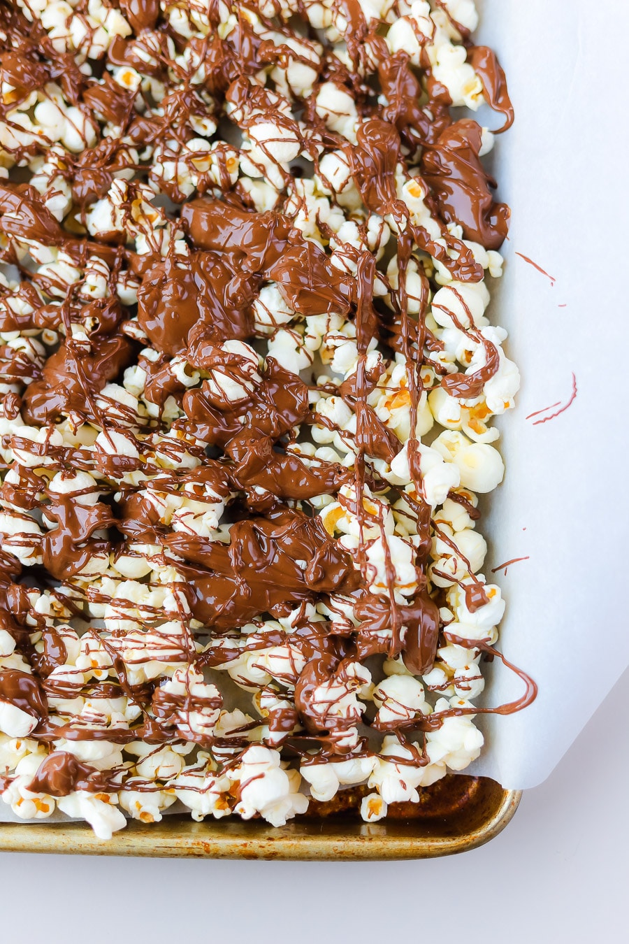 Chocolate Drizzled Popcorn - Bits And Bites