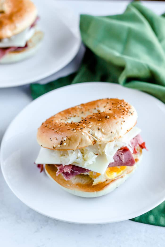 St. Patrick's Day isn't complete without a little hangover breakfast sandwich. So, why not make it festive with this Reuben Breakfast Sandwich?