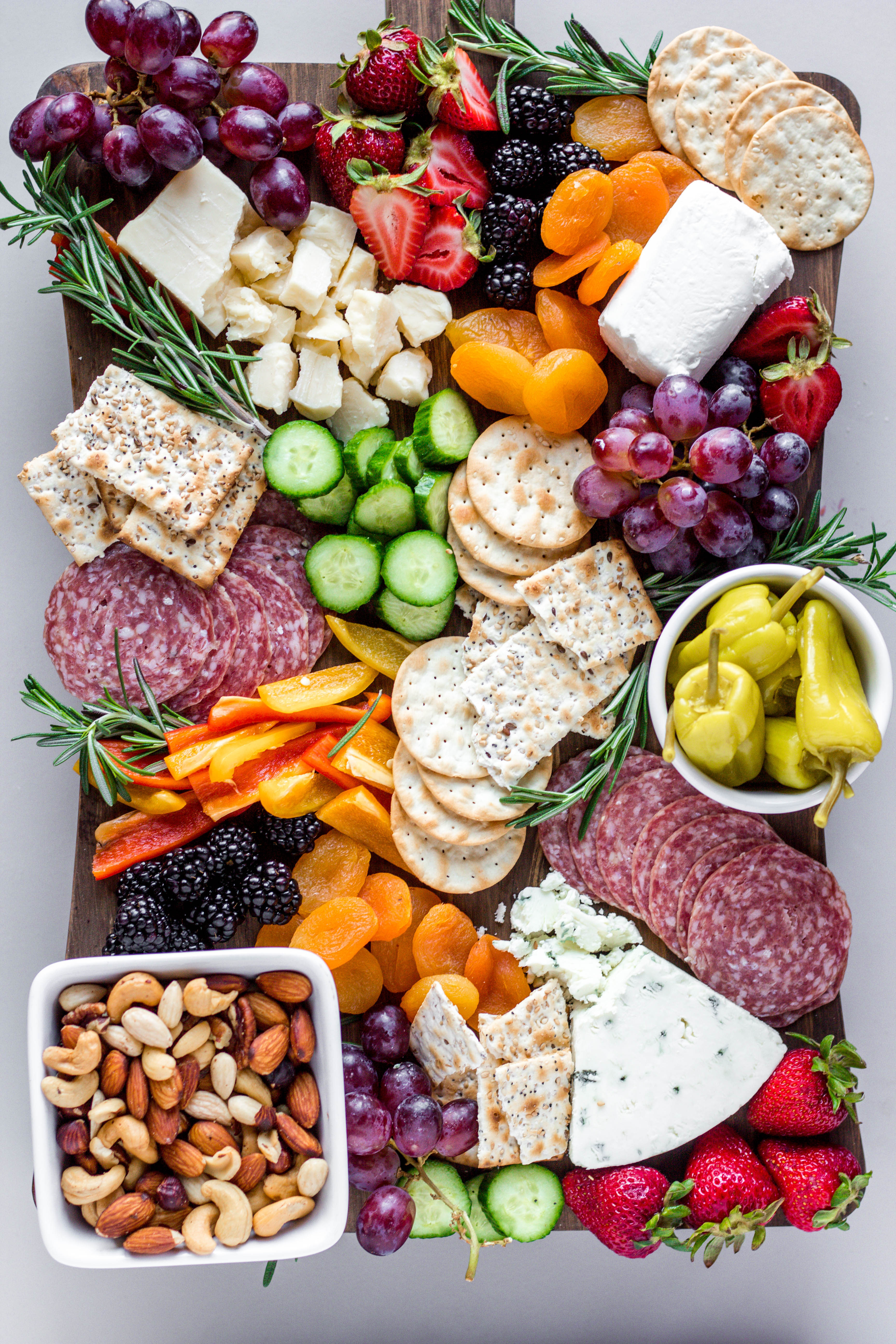 I love a good summer charcuterie board. With fresh produce from farmer's markets and summer BBQs, they are such a simple summer appetizer to put together. Here's how to put together a summer charcuterie board.