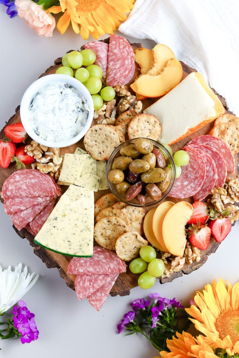 If you know me, you know I love a good charcuterie board. Sometimes it is fun to put together these huge displays, and other times, a small charcuterie board for two is all you need for a girls' night or date night.