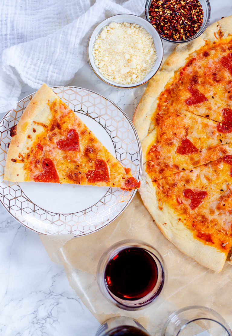 this homemade pizza night is one of my favorite at-home date night ideas! An at-home pizza date night is so cozy and once you start making your pizza homemade, you will love it.