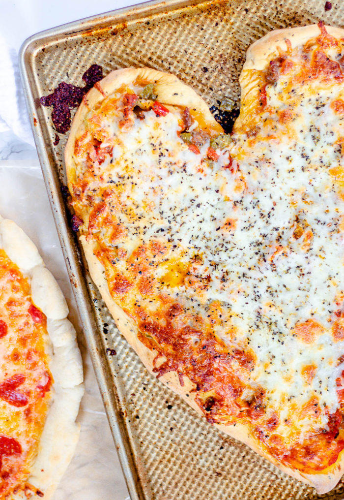 This homemade pizza date night is one of my favorite ways to spend weekend nights. It's a great Friday or Saturday at-home date night idea. But, it could also be a  great "make your own pizza night for a family." I'm sharing a no-fail homemade pizza crust recipe along with some of the best homemade pizza ideas. 