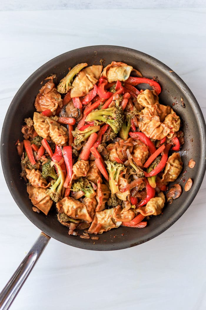 Do I need cornstarch for stir fry sauce? No! You absolutely don't. I don't use cornstarch in this recipe. I recommend pouring the sauce in when you start cooking the noodles so it really cooks into the veggies and you aren't left with a super runny sauce. 