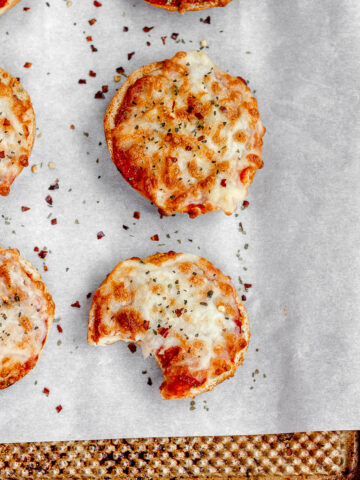 these homemade air fryer bagel bites are seriously the best mini pizza bagels! They are such an easy appetizer idea or make for a great quick and easy meal.
