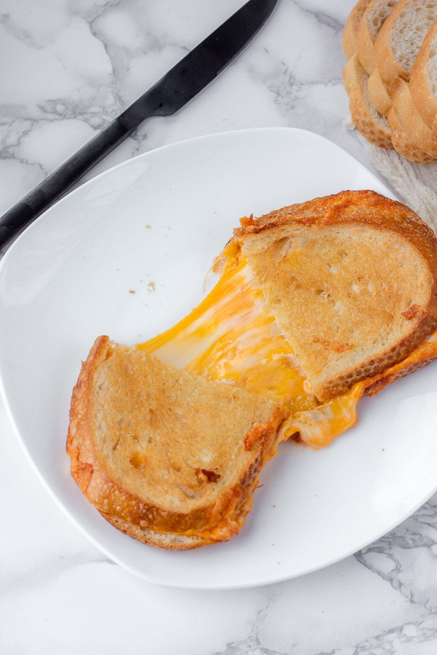 This easy air fryer grilled cheese with mayo guarantees you cook the most perfect grilled cheese every time! Say goodbye to burning your grilled cheese, once you cook a grilled cheese in the air fryer, you won't turn back.