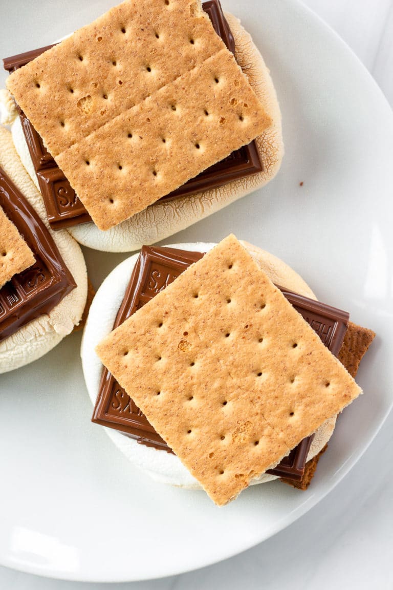 Yes. Air Fryer S'mores. It's a thing and it is incredible. If you're wondering how to make air fryer s'mores, don't worry it is beyond easy and so delicious. No, you don't get the ambiance of the campfire, but you get a s'more in like 5 minutes.