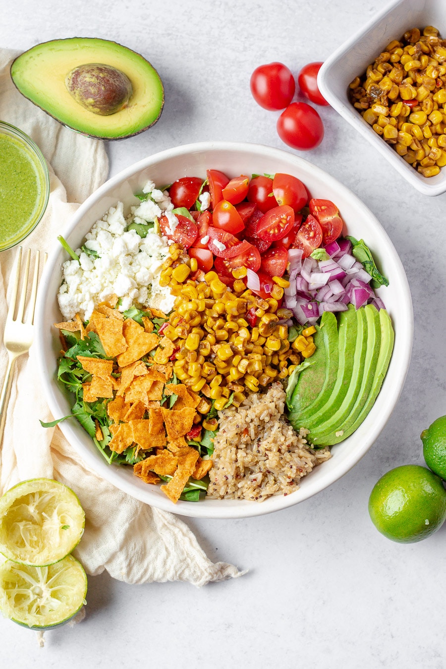 Sweetgreen's seasonal corn elote bowl was recently released, and it is so good. It brings together some of summer's best produce all with their lime cilantro jalapeño vinaigrette, ugh. So much goodness all in one bowl. Here's how you can make this copycat Sweetgreen Corn Elote Bowl recipe at home!