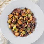 Honey Sriracha Brussels Sprouts in the air fryer is the best way to cook brussels sprouts. It's sweet, yet spicy, and such a great fall side dish recipe
