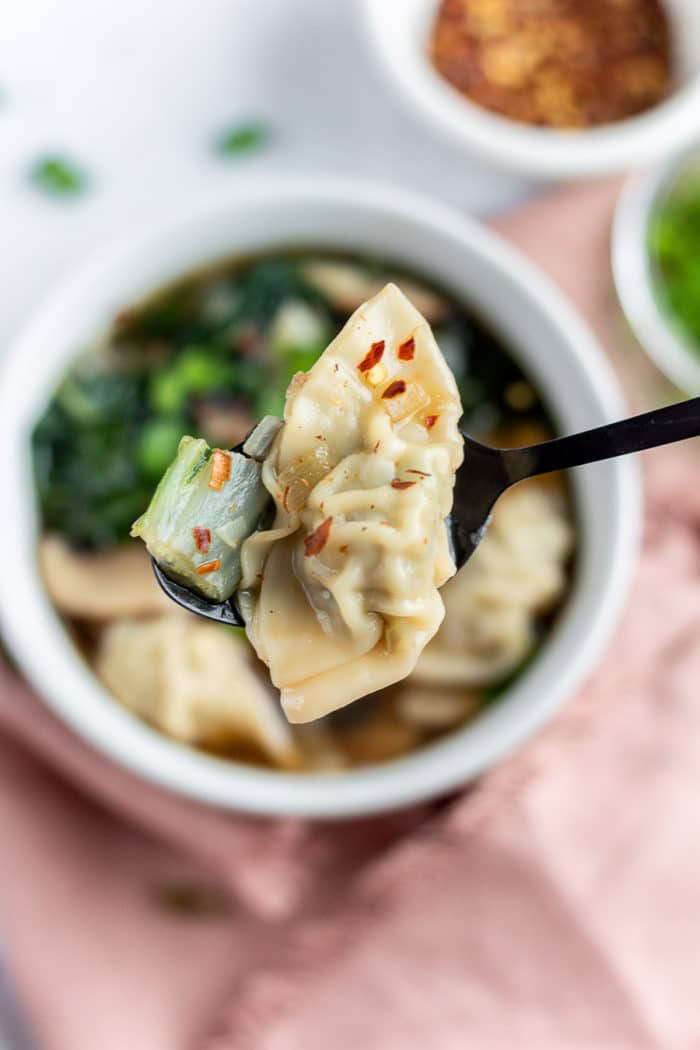 This wonton soup with frozen wontons are one of my favorite ways to cook frozen wontons! It's a great low-calorie soup recipe and you'll love it for a cozy weeknight dinner recipe.