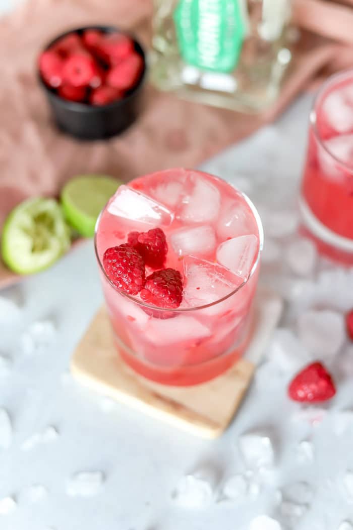 This raspberry margarita recipe is such a refreshing, low-calorie margarita recipe! I use diet tonic water and fresh raspberries to give this plenty of flavor, perfect to sip on year-round!