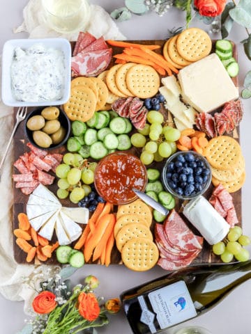 If you know me, you know I love making a charcuterie board for any occasion. So, I'm sharing all my tips for making the BEST ALDI charcuterie board!