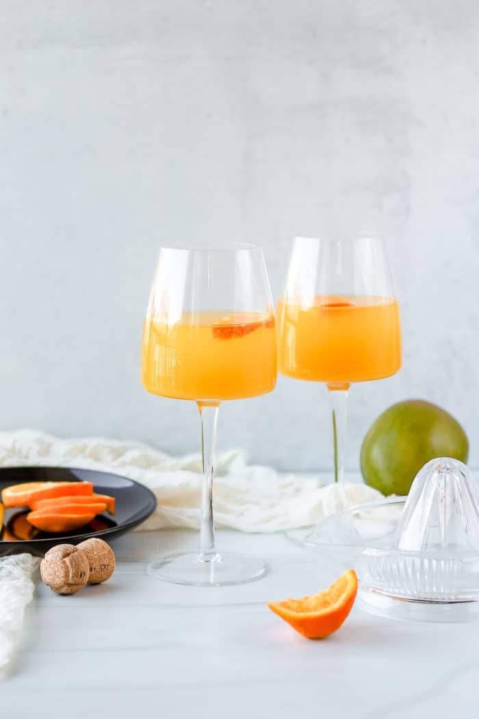 This mango mimosa is such a refreshing, tropical twist on the traditional mimosa recipe. You'll absolutely love it!