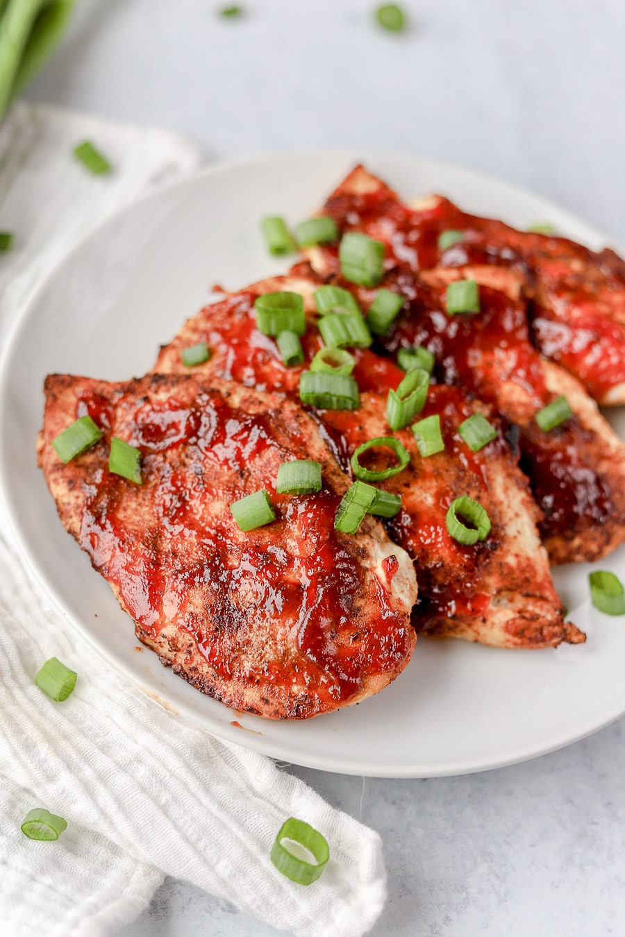 Air Fryer BBQ Chicken is such an easy way to prepare chicken for an easy weeknight dinner, or meal prepping recipe. You'll love this quick air fryer chicken recipe!