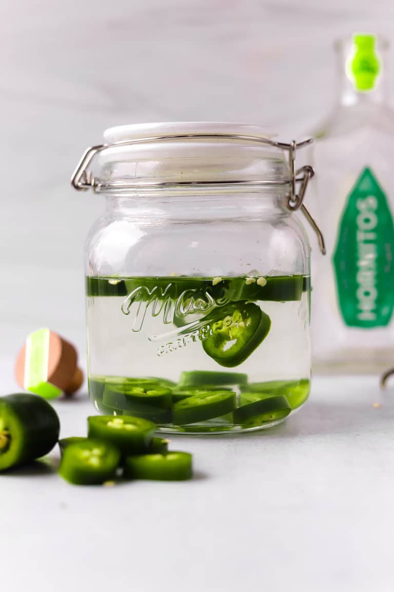 Jalapeno-infused tequila is so easy to make homemade! It's simple and makes some of the best spicy margaritas.