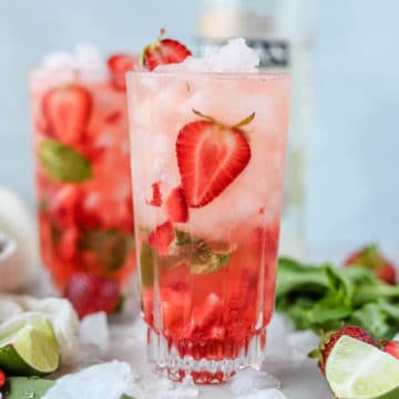This strawberry mint mojito recipe without simple syrup is so crisp and refreshing, and so easy to make! You'll love sipping on this strawberry and rum cocktail recipe all summer long.