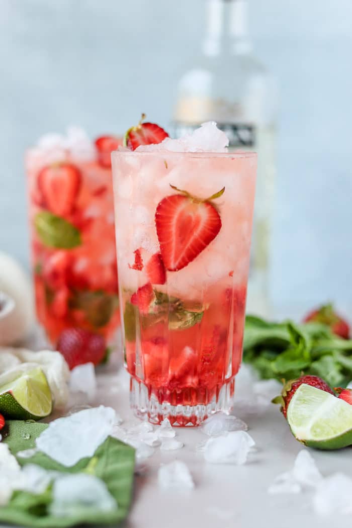 This strawberry mint mojito recipe without simple syrup is so crisp and refreshing, and so easy to make! You'll love sipping on this strawberry and rum cocktail recipe all summer long.