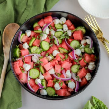 If you're looking for summer captured in a single salad, this watermelon basil salad with cucumber and mozzarella is it. It's the perfect balance of sweet, savory, crunchy, soft and everything you could ever want out of a watermelon salad recipe.