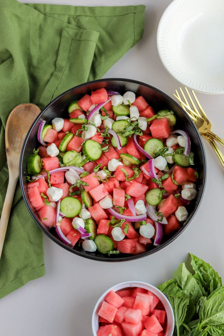 If you're looking for summer captured in a single salad, this watermelon basil salad with cucumber and mozzarella is it. It's the perfect balance of sweet, savory, crunchy, soft and everything you could ever want out of a watermelon salad recipe.
