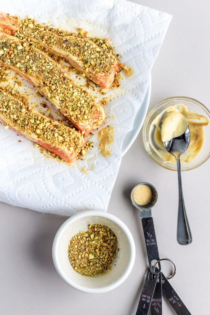 if you love pistachio crusted fish, you will love this easy pistachio crusted salmon using a mustard and pistachio crust!