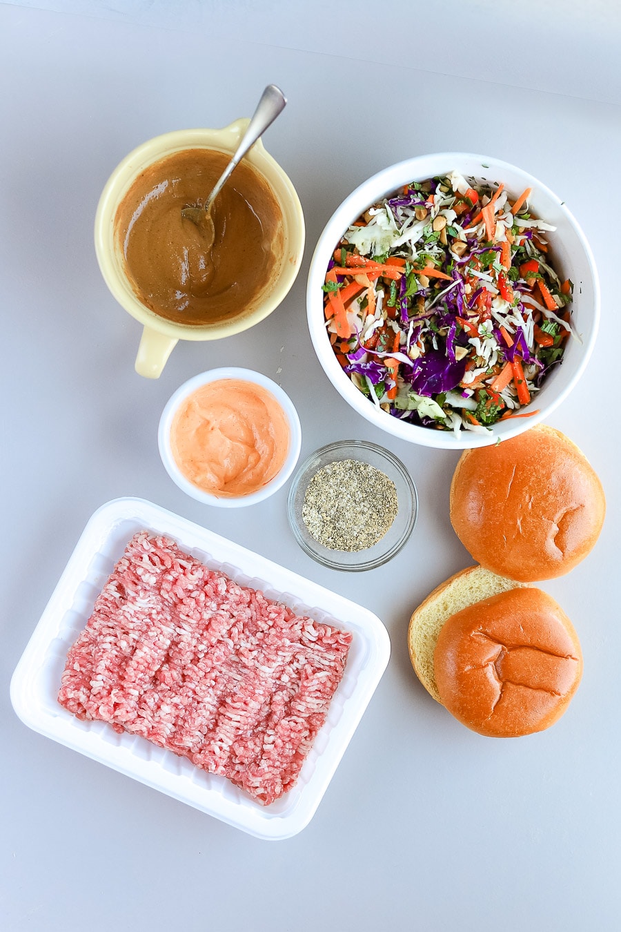 Ground Pork Burgers with Thai-Inspired Peanut Slaw - bits and bites
