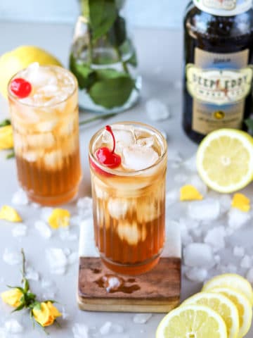 The John Daly cocktail is the drink of the summer, and when you make it with Deep Eddy's Sweet Tea Vodka, it's a super simple 2-ingredient cocktail. It's the perfect poolside refresher or drink to make while you're soaking n the sun on a boat or at a beach.