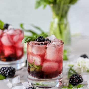 This blackberry bourbon smash with fresh basil is such a refreshing summer bourbon cocktail recipe. It takes advantage of in-season produce and herbs paired with a slightly sweet and spicy to create this refreshing drink.