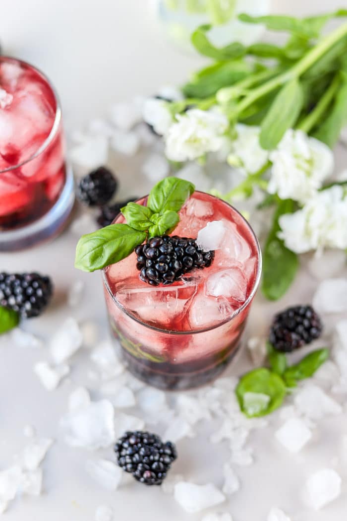 This blackberry bourbon smash with fresh basil is such a refreshing summer bourbon cocktail recipe. It takes advantage of in-season produce and herbs paired with a slightly sweet and spicy to create this refreshing drink.