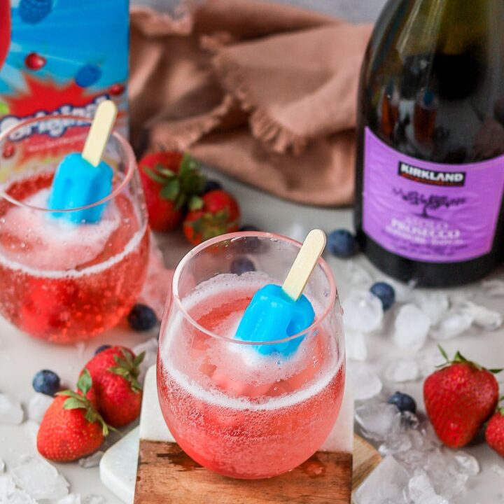 This festive 4th of July cocktail is only two ingredients and it's so easy to make! It's a combination of the nostalgic Bomb Pops with an adult twist, you'll love this Bomb Pop cocktail!