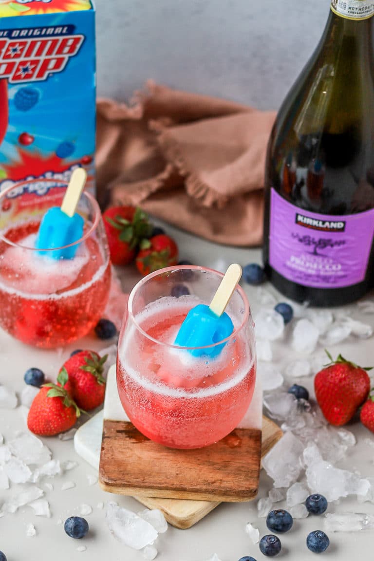 This festive 4th of July cocktail is only two ingredients and it's so easy to make! It's a combination of the nostalgic Bomb Pops with an adult twist, you'll love this Bomb Pop cocktail!