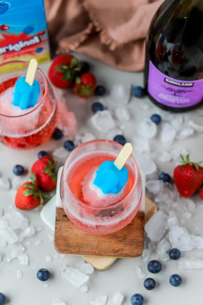 This festive 4th of July cocktail is only two ingredients and it's so easy to make! It's a combination of the nostalgic Bomb Pops with an adult twist, you'll love this Bomb Pop cocktail!