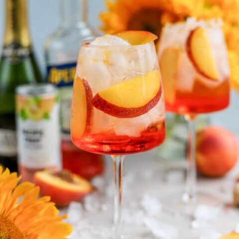 I love a good Aperol Spritz, especially in the summertime. But, to add a fun and summery twist to the traditional Aperol Spritz recipe, meet the Peach Aperol Spritz!
