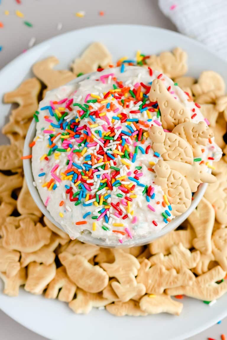 Remember the 90's classic Dunkaroos? I'm sharing this homemade Dunkaroo Dip so you can whip up all the nostalgia and get everyone hooked on this easy cake batter dessert dip. It's seriously so good!
