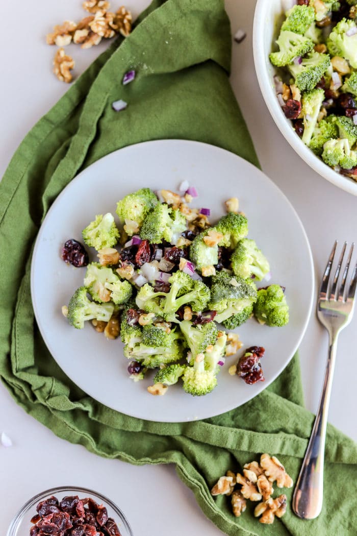I love this broccoli crunch salad! It is one of my favorite summer side dish recipes, and it is so easy to make at home.