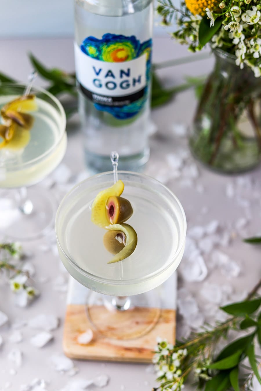 Dirty Vodka Martini with Pickle Juice bits and bites