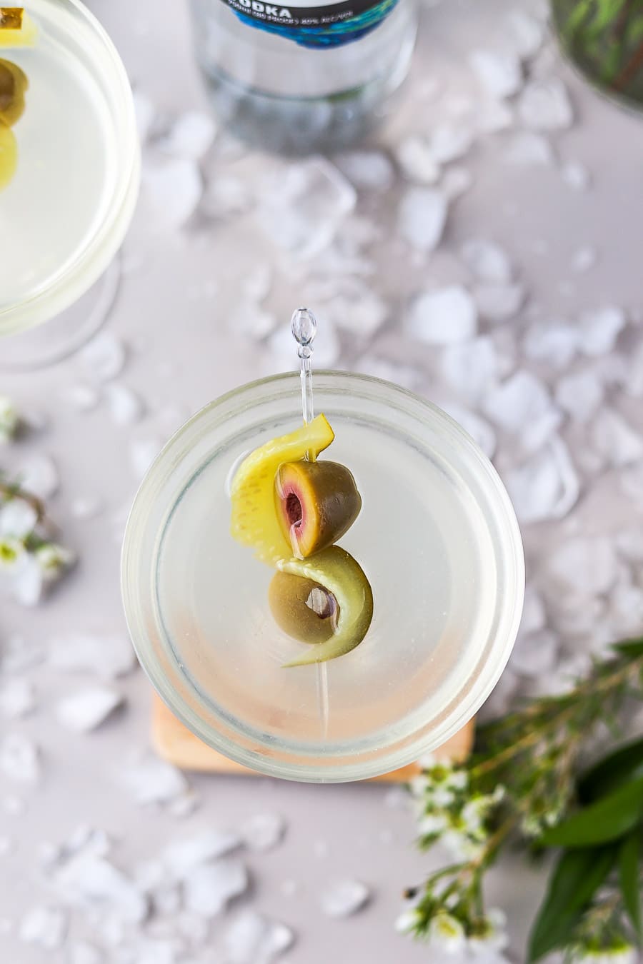Dirty Vodka Martini with Pickle Juice bits and bites