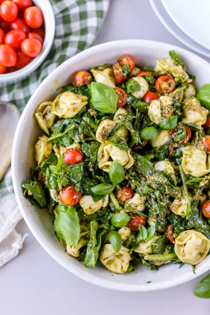 If you are looking for a simple pasta salad recipe, this pesto tortellini salad will be a favorite! It is so easy to make and it is the perfect summer salad side dish or you can enjoy it as a meal itself.