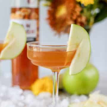 This caramel apple martini is such a delicious fall martini recipe! It's 2 ingredients, super simple and it is love at first sip, trust me.