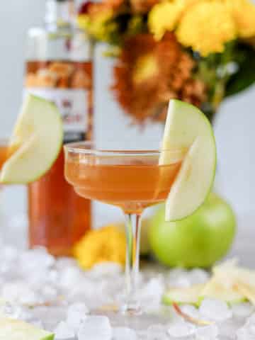 This caramel apple martini is such a delicious fall martini recipe! It's 2 ingredients, super simple and it is love at first sip, trust me.