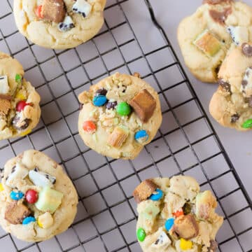 These Halloween candy cookies are one of my favorite ways to use leftover Halloween candy. They're like chocolate chip cookies, but a million times better!
