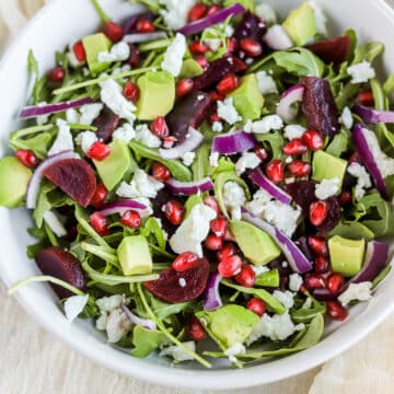 This arugula goat cheese beet salad is so simple, yet so delicious. It's easy for a quick salad recipe or it makes for a perfect side salad.