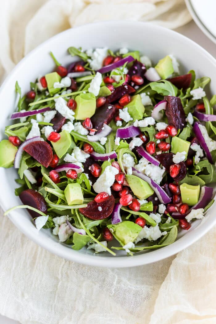 This arugula goat cheese beet salad is so simple, yet so delicious. It's easy for a quick salad recipe or it makes for a perfect side salad.