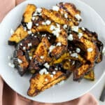Air fryer acorn squash will quickly be your favorite way of cooking winter squash if you haven't tried it. I use a little bit of honey, chipotle powder, garlic, and salt for this lovely, spicy and savory flavor combination.