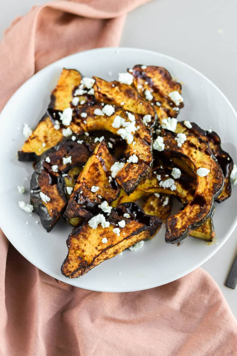 Air fryer acorn squash will quickly be your favorite way of cooking winter squash if you haven't tried it. I use a little bit of honey, chipotle powder, garlic, and salt for this lovely, spicy and savory flavor combination.