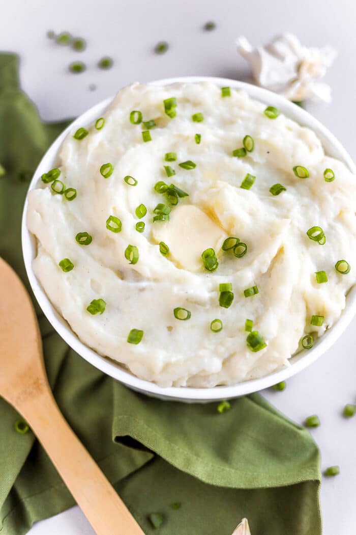 Whipped mashed potatoes are such a perfect side dish for fall and winter. By whipping the potatoes, you not only get a super light and fluffy texture, but you don't have to mash them! That's a win-win in my book.