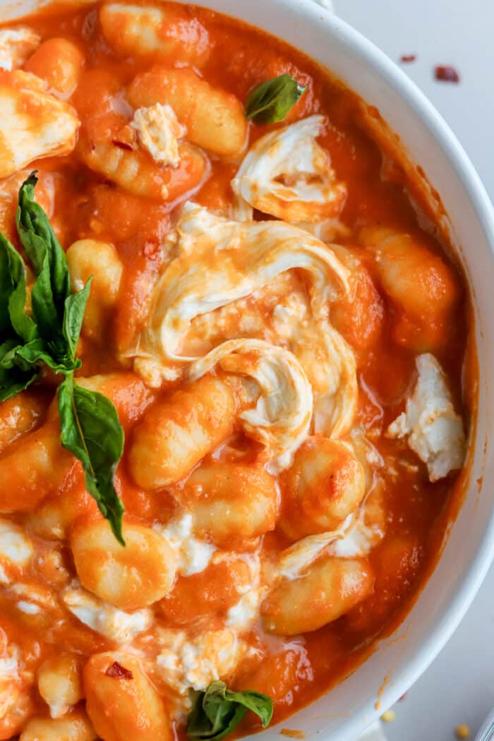 If you are looking for a cozy winter recipe, this gnocchi alla vodka topped with creamy burrata is so delicious. The rich homemade vodka sauce cooked with pillowy gnocchi is so easy to whip together.
