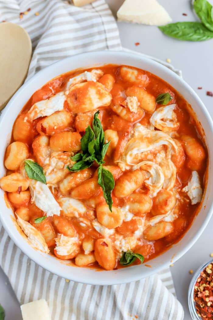 If you are looking for a cozy winter recipe, this gnocchi alla vodka topped with creamy burrata is so delicious. The rich homemade vodka sauce cooked with pillowy gnocchi is so easy to whip together.