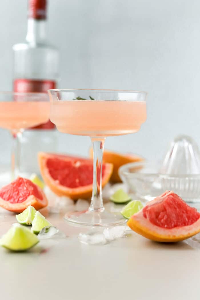 This grapefruit martini is the perfect winter cocktail! The fresh grapefruit juice paired with honey simple syrup and vodka is so refreshing, you'll love it!