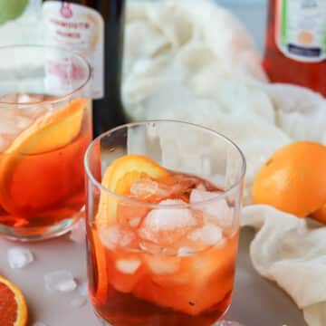 This Aperol Negroni is the perfect twist on the traditional Negroni recipe. If you don't like Campari bitters, but you want an easy cocktail recipe this is for you!