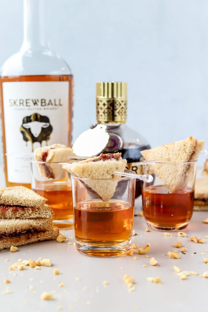 A peanut butter and jelly shot is so delicious and so much fun. The tasty peanut butter whiskey with fruity Chambord is the perfect combination for a fun signature shot.