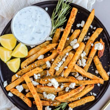 If you're looking for a way to take any french fries recipe to the next level, these feta fries are the recipe you want! The Mediterranean flavors are so fresh and make for the perfect easy appetizer or side dish.